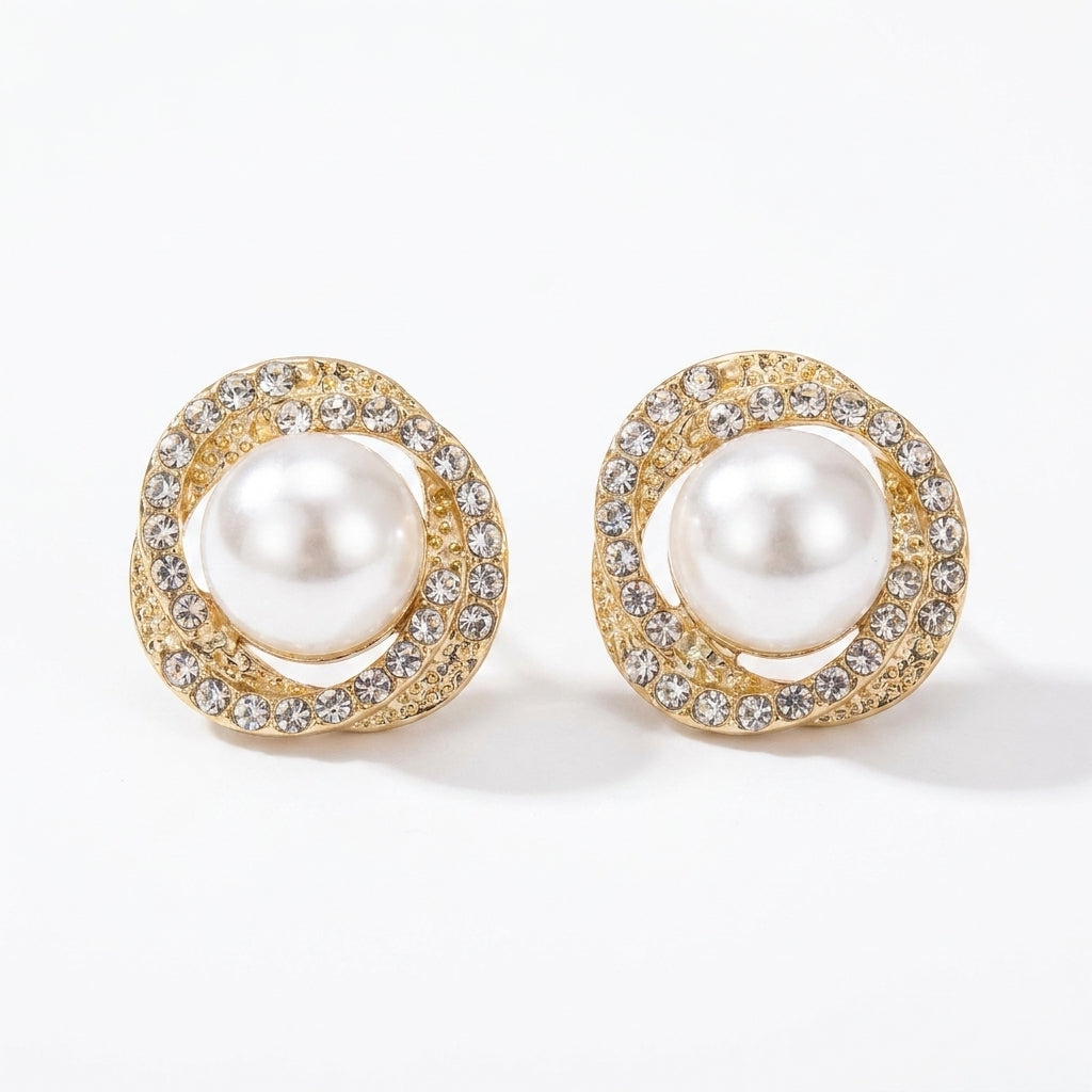 Round pearl centre stud earrings with swirling gold-tone crystal-encrusted frame